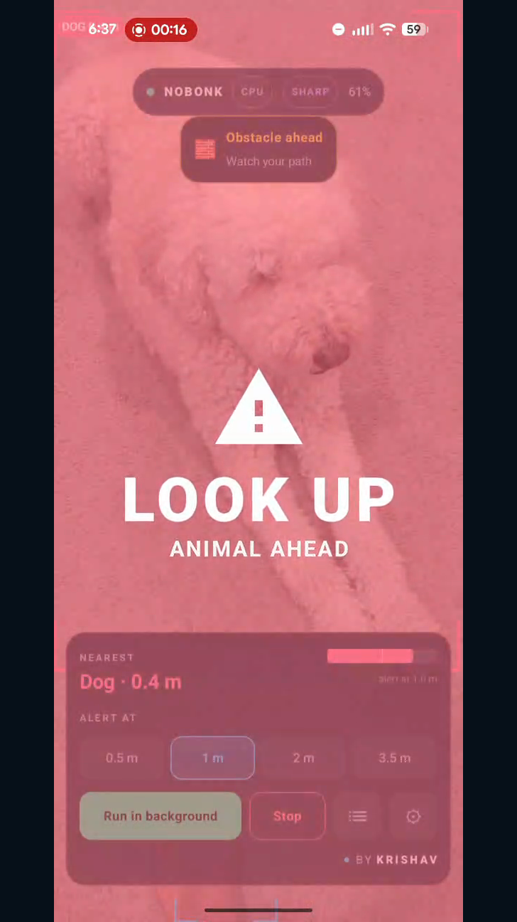 Actual NoBonk screen showing a red LOOK UP alert with the message ANIMAL AHEAD